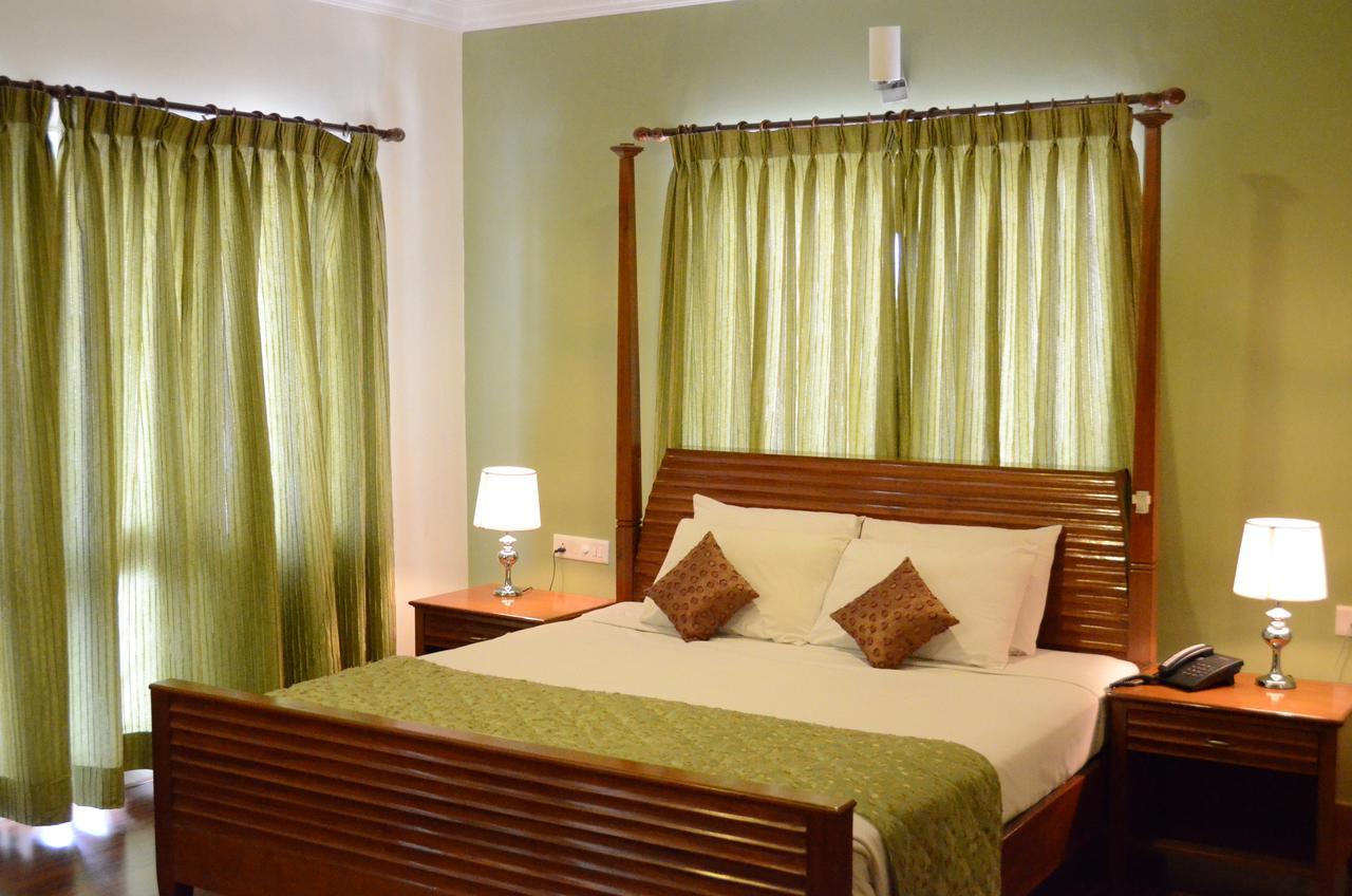 ทรินิตี้ สวีทส์ Hotel บังกาลอร์ ภายนอก รูปภาพ